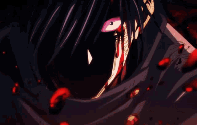 a close up of a person 's face with blood coming out of his mouth
