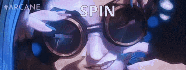 a close up of a person wearing sunglasses with the words `` spin '' written on the bottom .