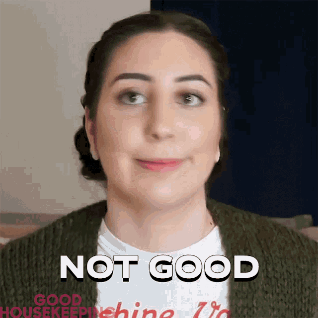 a woman wearing a green sweater says " not good "