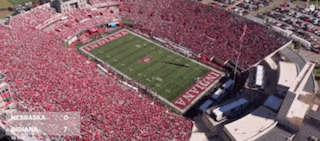 an aerial view of a football field with the word indiana on the field