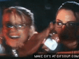 a gif of two women with the words make gifs at gifsoup.com below them