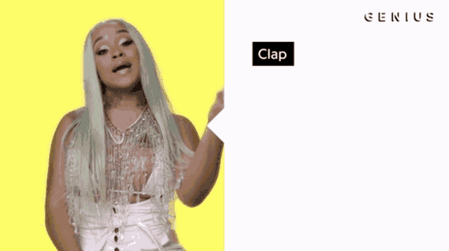 a woman with green hair is standing in front of a yellow background with the words " clap clap " on it