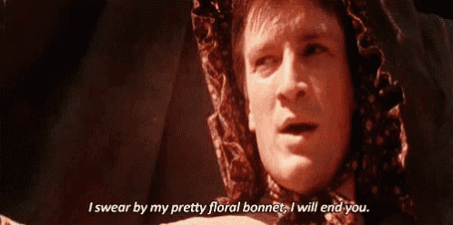 a man is wearing a floral bonnet and saying i swear by my pretty floral bonnet i will end you