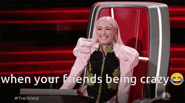 a woman is sitting in a chair with the words " when your friends being crazy "
