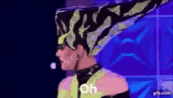 a pixel art of a person wearing a zebra print hat with the word on written on it .