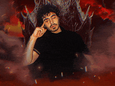a man in a black shirt is sitting on a throne with his hand on his forehead
