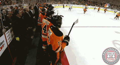 a hockey game is being played at the philadelphia sons of penn stadium
