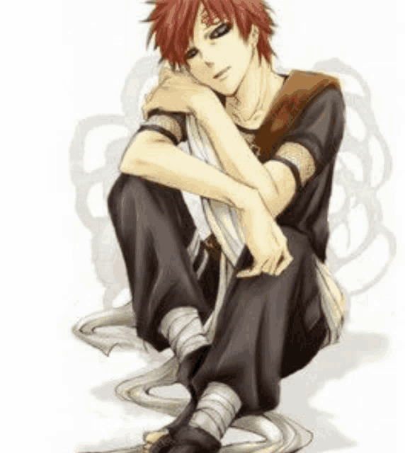 a man with red hair is sitting down with his legs crossed and his head resting on his knee .
