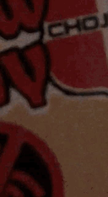a close up of a sign that says chojin