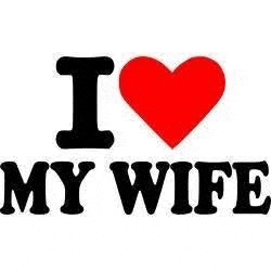 a sign that says `` i love my wife '' with a heart .