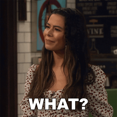 a woman in a floral top is asking what