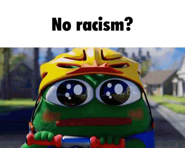 a green frog wearing a yellow helmet is riding a scooter and says no racism .
