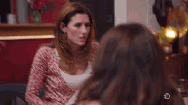 a woman talking to another woman with the words c'est de la science-fiction