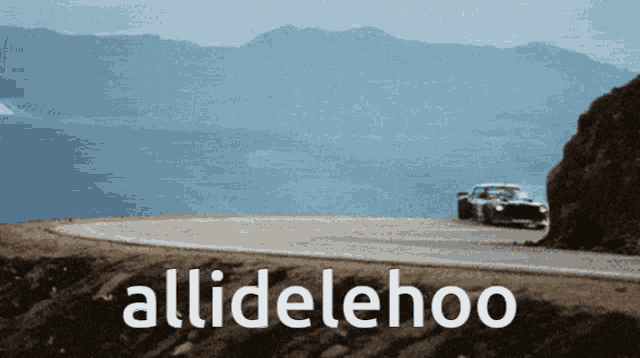 a car is driving down a road with the words allidelehoo written below it
