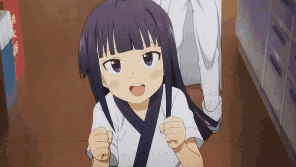 a little girl with purple hair is standing in a room with her fist in the air
