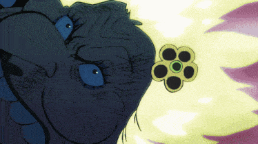 a close up of a person 's face with a flower in the foreground