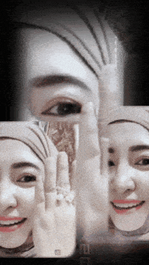 a woman wearing a hijab is smiling and covering her face with her hand