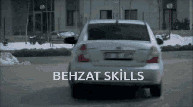 behzat skills is written on the back of a car driving down a street