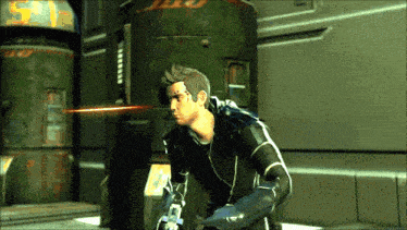 a man in a video game is holding a gun in front of a green cylinder with the number 51 on it