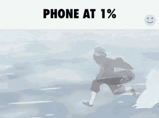 a person is riding a wave in the ocean while holding a cell phone .