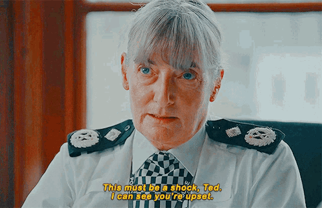 a woman in a police uniform says " this must be a shock "