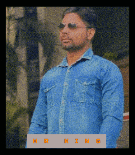 a man wearing sunglasses and a blue shirt has the word hr king on the bottom