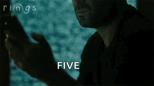 a man talking on a cell phone with the words five seven days written below him