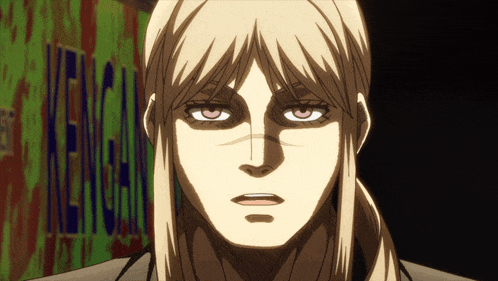 a close up of a person 's face with a sign in the background that says kenchan