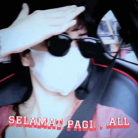 a woman wearing sunglasses and a face mask says " selamat pagi all "