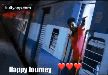 a man is standing on the steps of a train with hearts and the words `` happy journey '' .