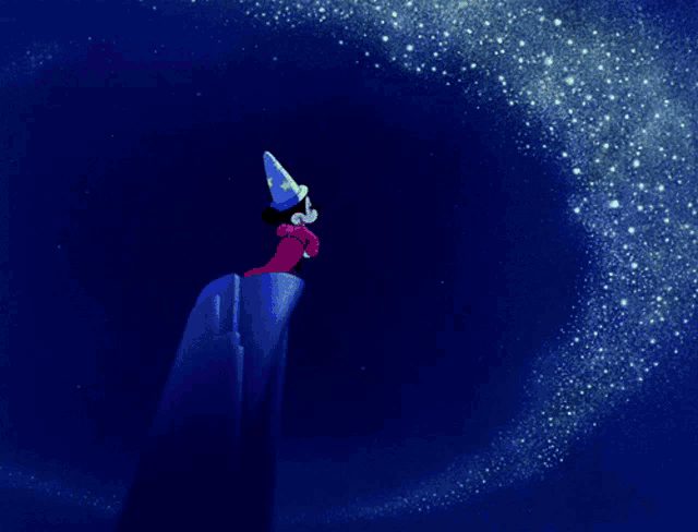 a cartoon of mickey mouse wearing a wizard 's cape