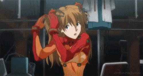 a girl in a red suit is putting on her hair .