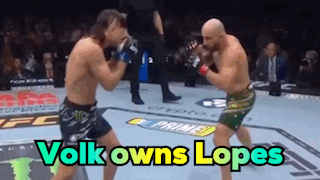 two men are fighting in a boxing ring and the words volks owns lopes are on the screen
