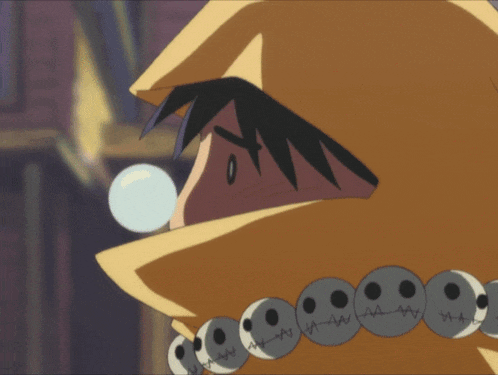 a cartoon character with skulls around his mouth