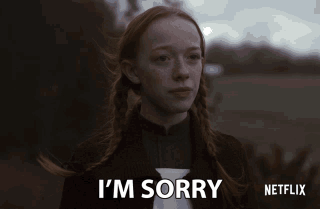 a girl with red hair says i 'm sorry on a netflix ad