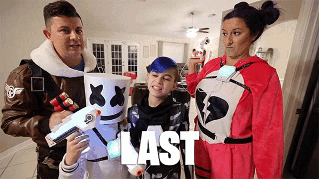 a group of people dressed in costumes with the word last on the bottom right