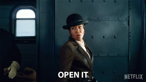 Open It Trudy Smith GIF - Open It Trudy Smith The Harder They Fall GIFs