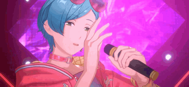 a girl with blue hair is singing into a microphone on a stage .