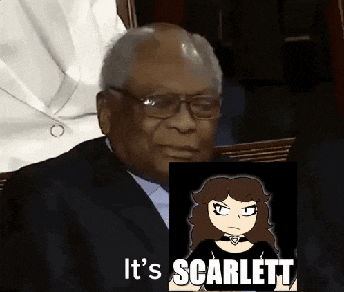 a man in a suit is holding a picture of a girl with scarlett written on it