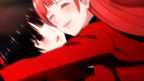 a girl with red hair is hugging another girl in a red jacket