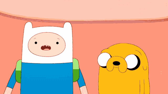 a cartoon character named finn is standing next to a cartoon character named jake