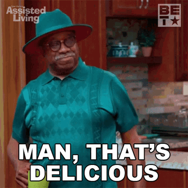 a man wearing a green shirt and a green hat says man that 's delicious
