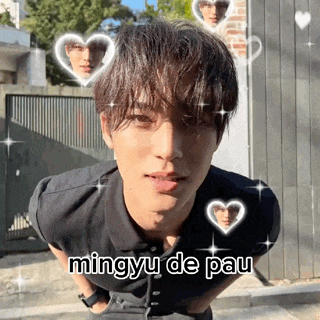a young man with hearts around his head and the words mingyu de pau written below him