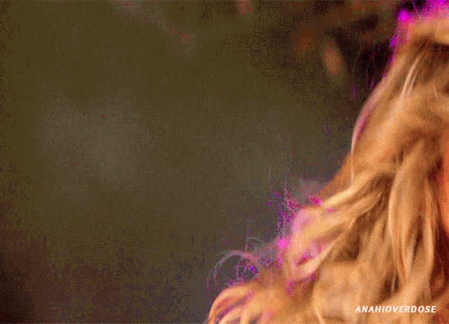 a close up of a woman 's face with the words anahioverdose below her