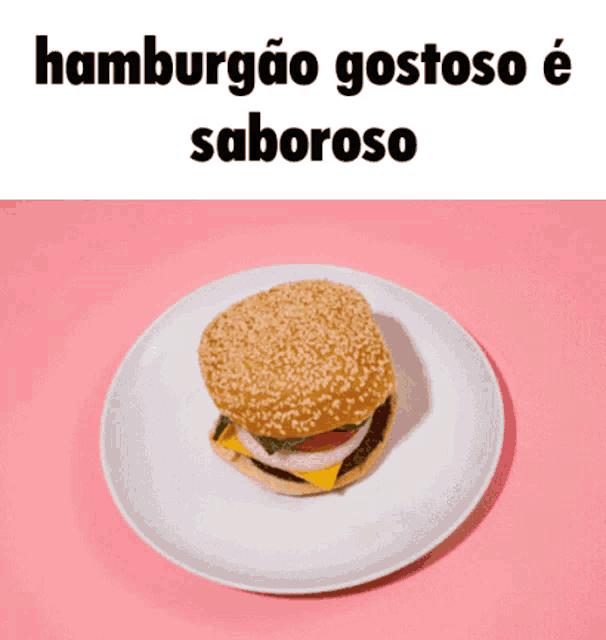 a white plate with a hamburger on it and the words hamburgao gostoso e saboroso