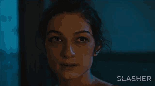 a close up of a woman 's face with the words no slasher on the bottom