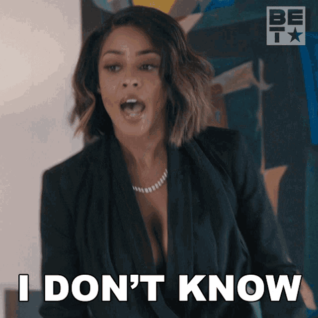 a woman says i don 't know while wearing a black jacket