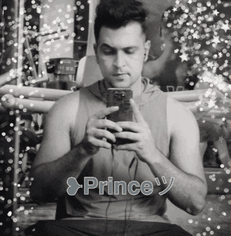 a black and white photo of a man taking a selfie with the name prince written on the bottom