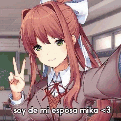 a girl is taking a selfie in a classroom with the words `` soy de mi esposa mika < 3 '' .