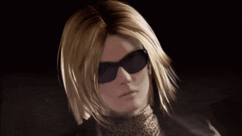 a woman with blonde hair wearing sunglasses and a scarf